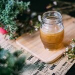 shallow focus photography clear glass jar on chopping board